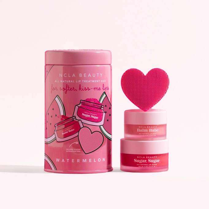 Tin of watermelon lip care set placed beside the lip scrub, lip balm and lip scrubber