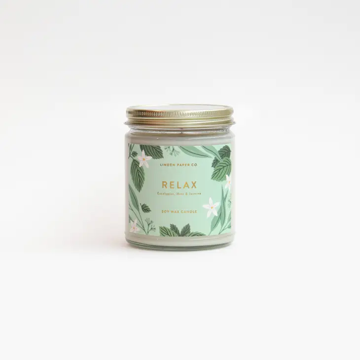 Candle jar with glass lid and illustrated Relax label printed in full colour with gold foil text